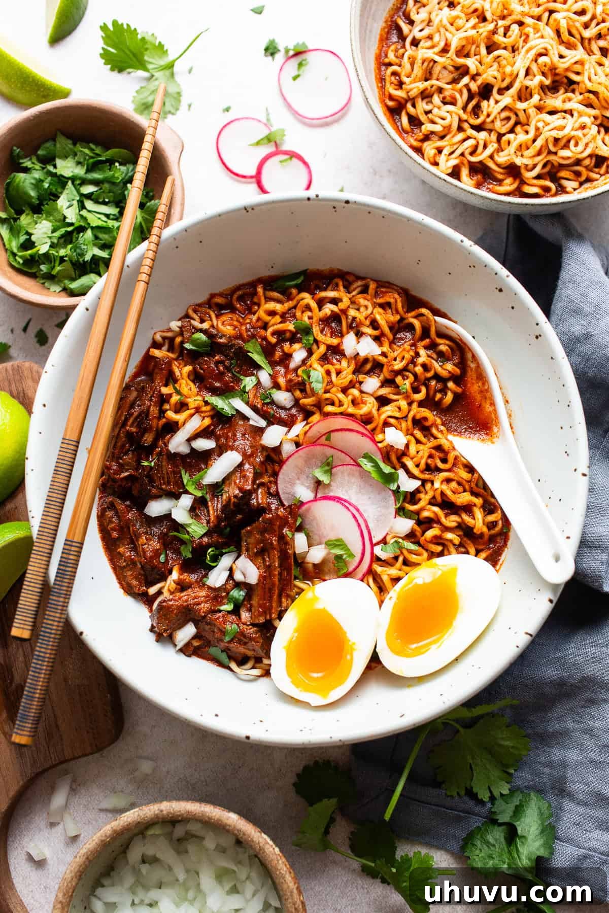 Ultimate Birria Ramen 7 A delicious bowl of Birria Ramen, ready to be enjoyed with its rich broth, tender meat, and vibrant toppings.
