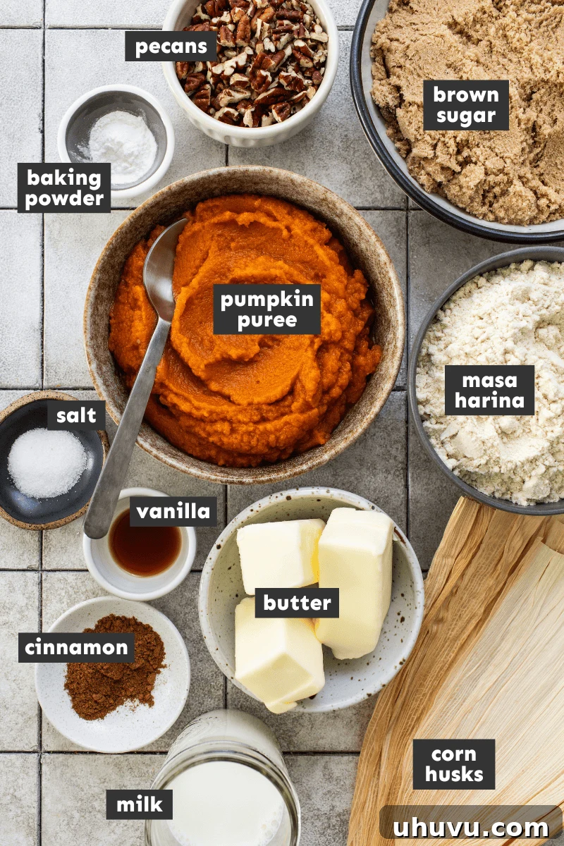Harvest Pumpkin Tamales 3 A rustic wooden table displays all the ingredients needed to make Pumpkin Tamales, including corn husks, masa harina, pumpkin puree, spices, and pecans.