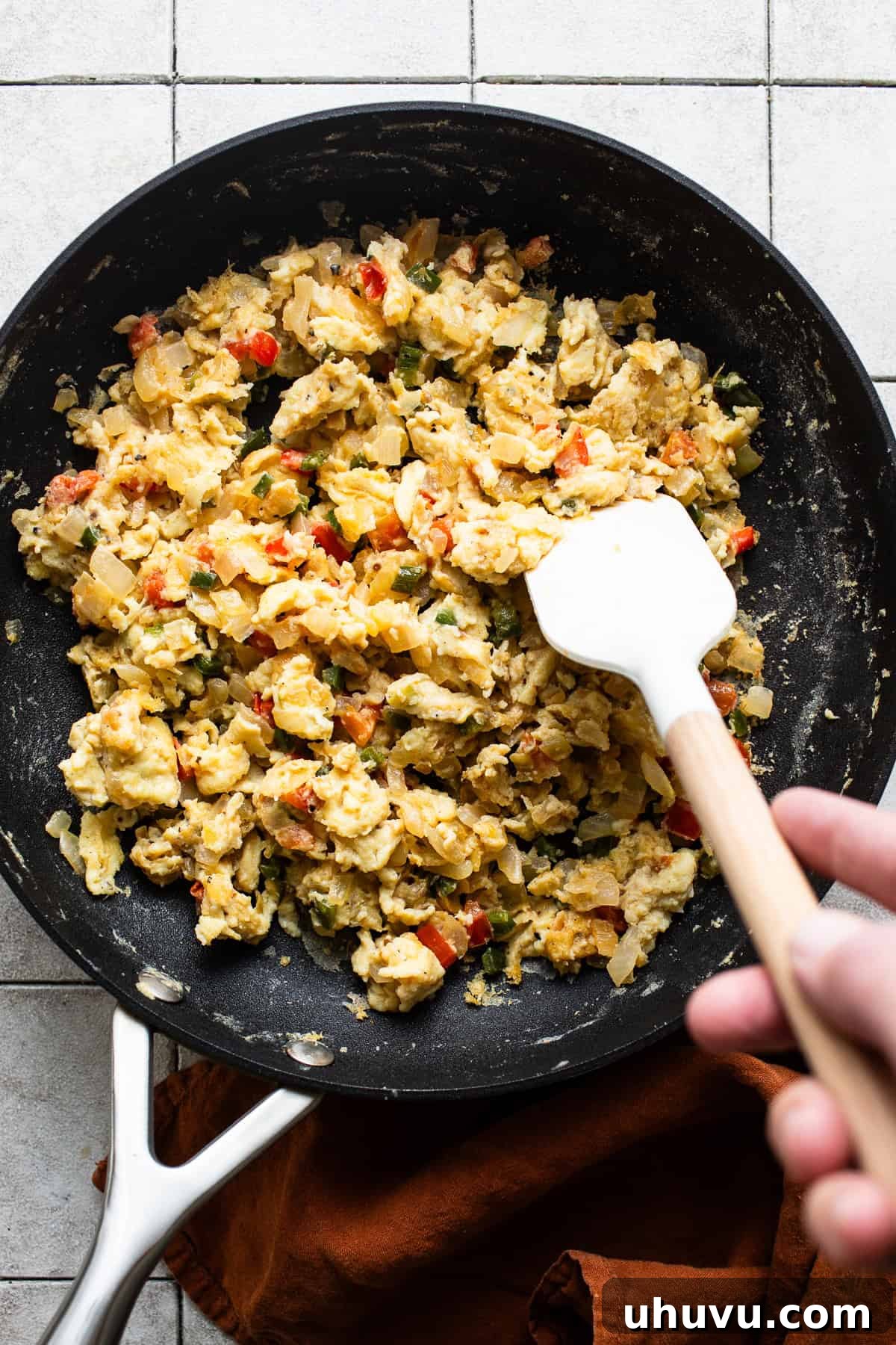 Sunrise Crunch Tostadas 6 Mix in the egg mixture to the sauteed vegetable mixture until eggs are completely scrambled and just set.