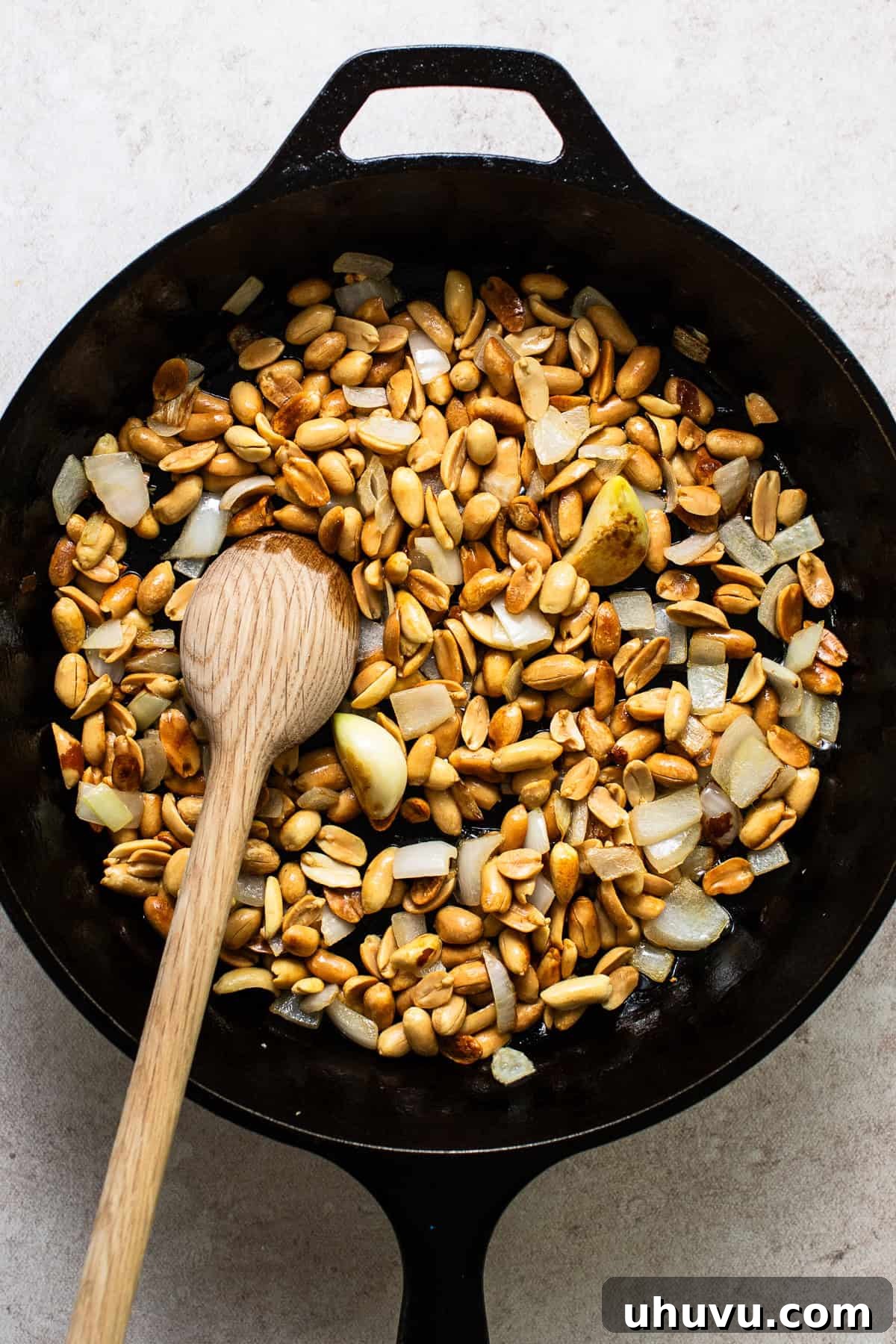 Creamy Peanut Salsa 4 Peanuts, chopped onions, and garlic cloves pan-frying in a skillet until fragrant and lightly golden.