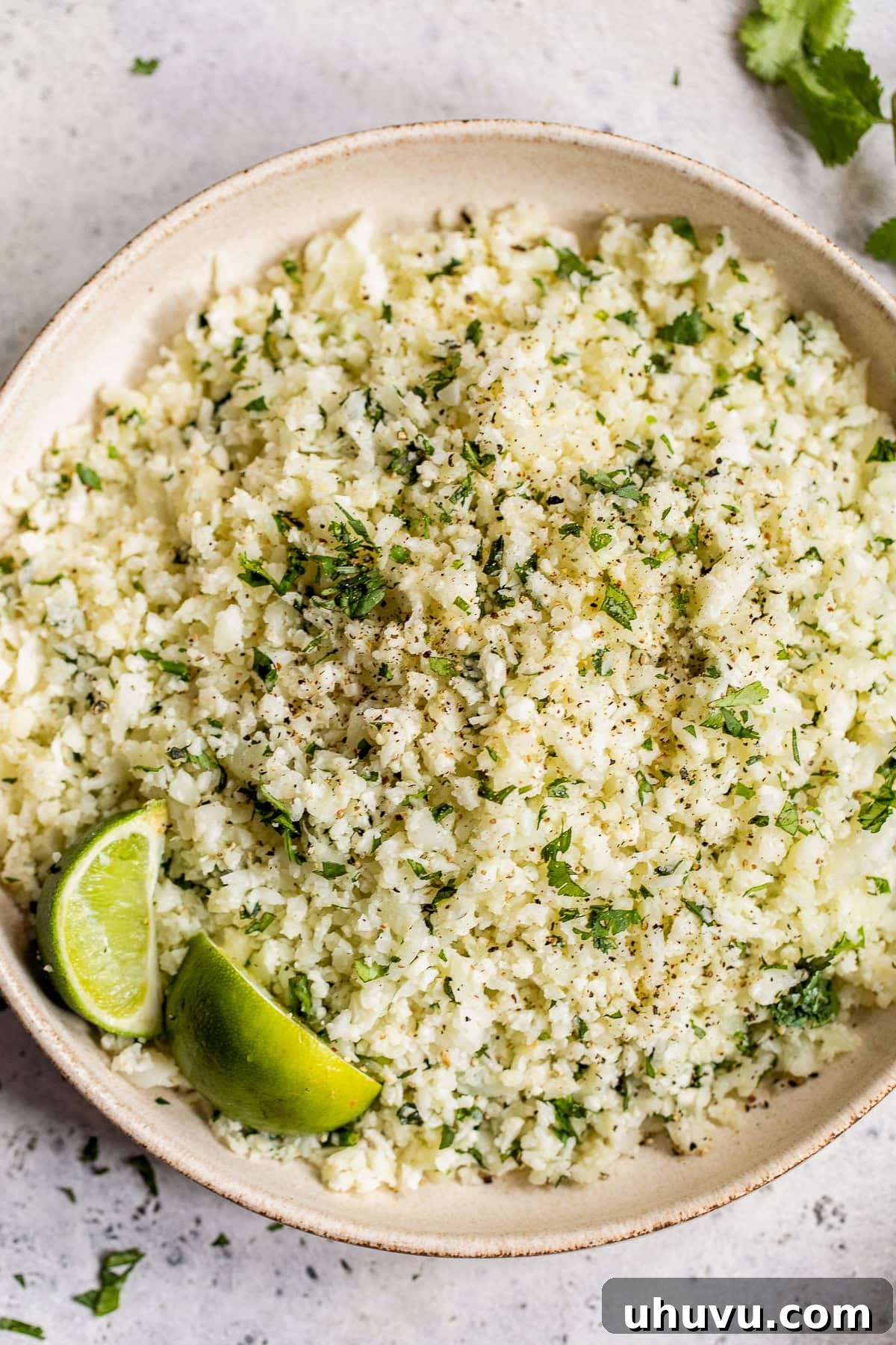 Zesty Cilantro-Lime Cauliflower Rice 8 Cilantro Lime Cauliflower Rice in a bowl.