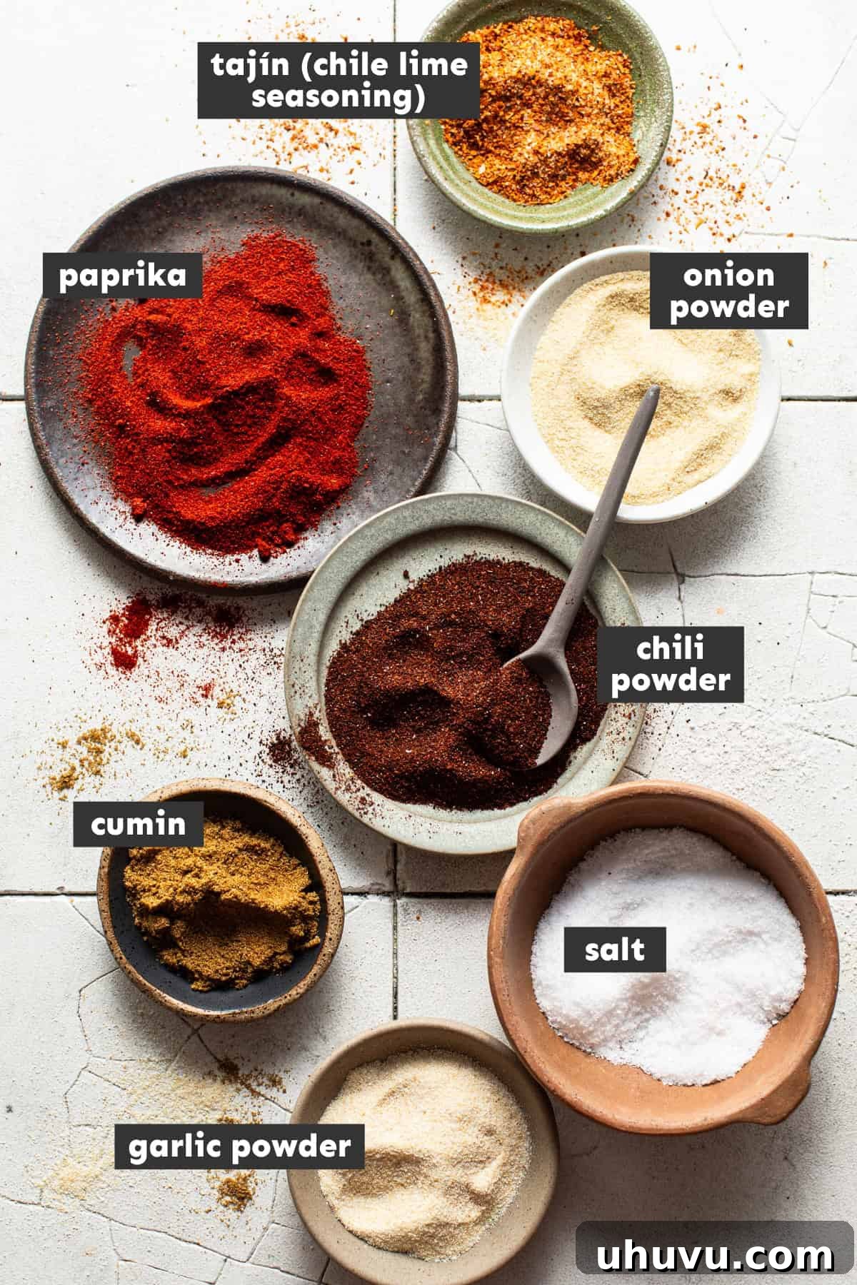 Sizzling Fajita Spice 3 Fajita seasoning ingredients on a table.