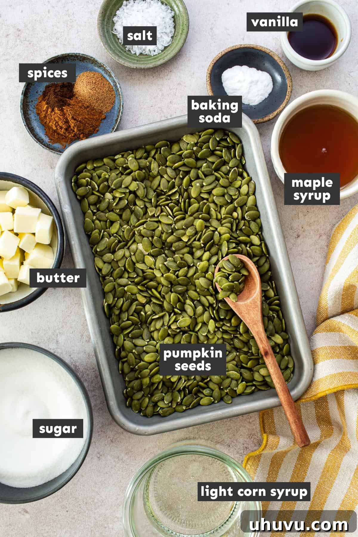 Crispy Pumpkin Seed Brittle 4 A beautiful flat lay photograph displaying all the fresh, high-quality ingredients needed to prepare delicious pumpkin seed brittle on a rustic wooden table.