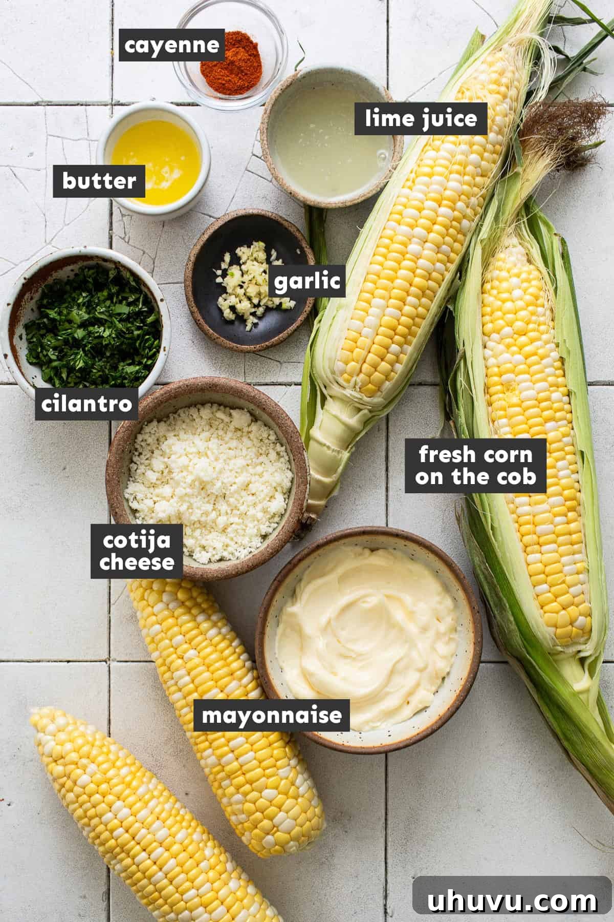 Elote recipe ingredients on a table.