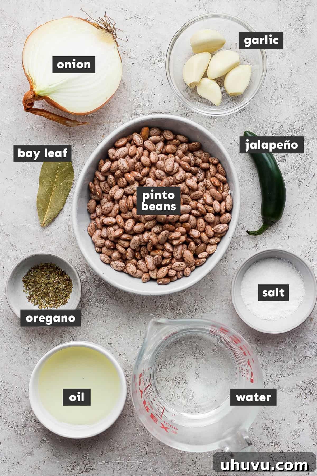 Velvety Frijoles 3 Ingredients in refried beans on a table.