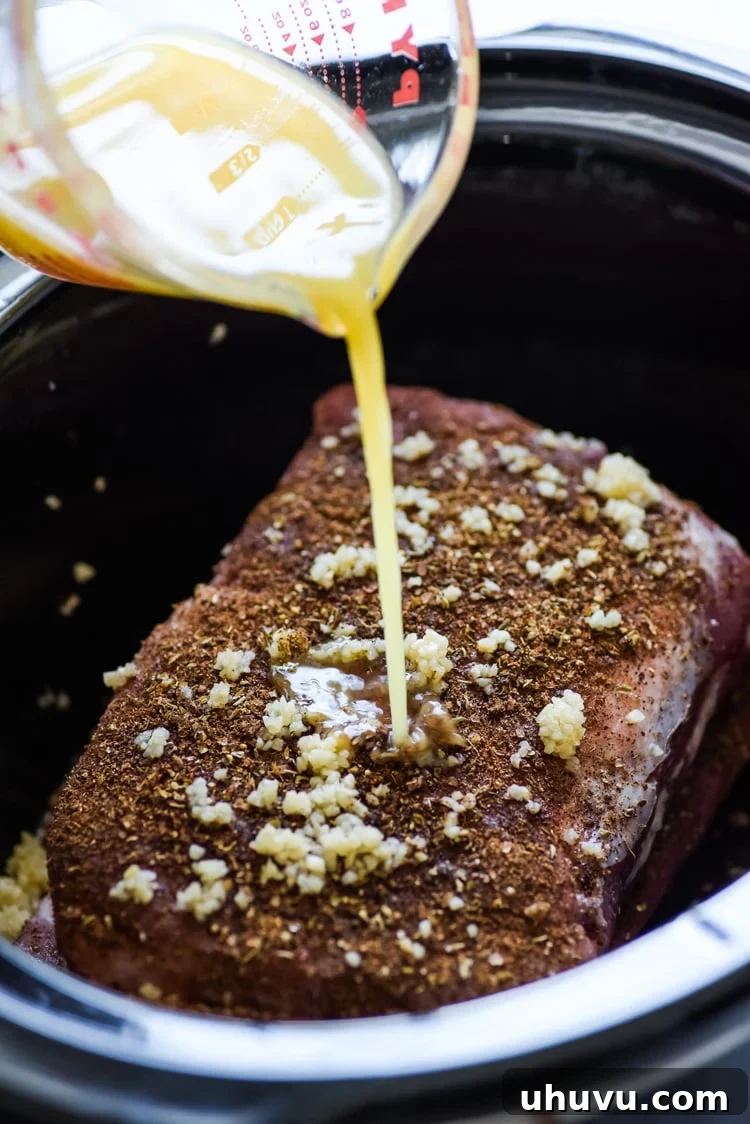 These Slow Cooker Pork Rib Tacos are seasoned with Mexican spices and cooked in orange juice for a delicious and easy weeknight meal! (gluten free)