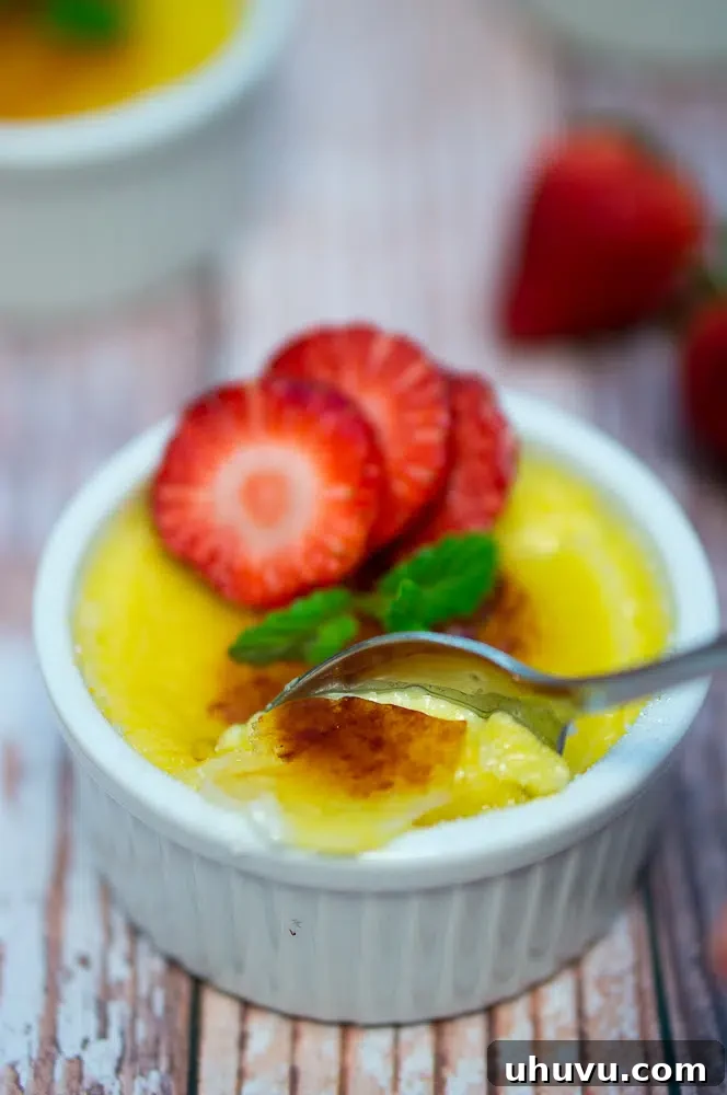 Side view of Creme Brulee with berries