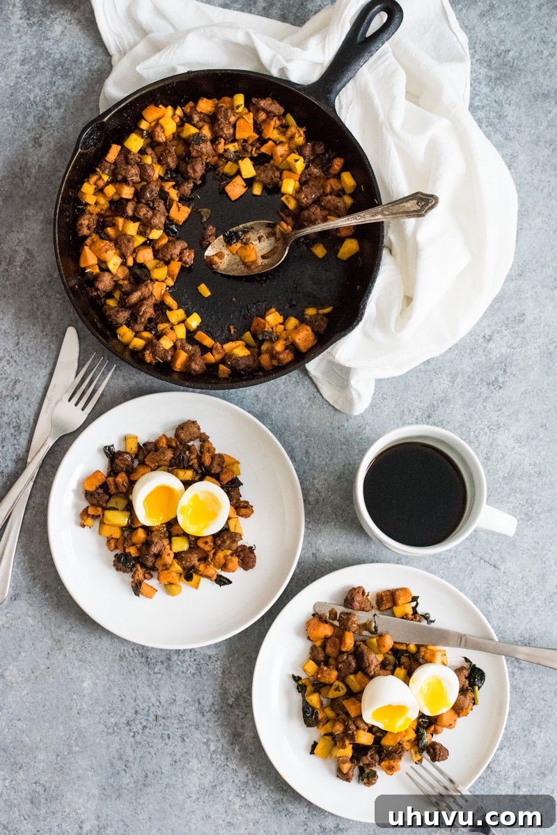 Mexican Chorizo Sweet Potato Hash with Jammy Eggs 5 Another appealing view of the Mexican Chorizo Sweet Potato Hash with a soft-boiled egg, emphasizing its rich texture and inviting presentation.