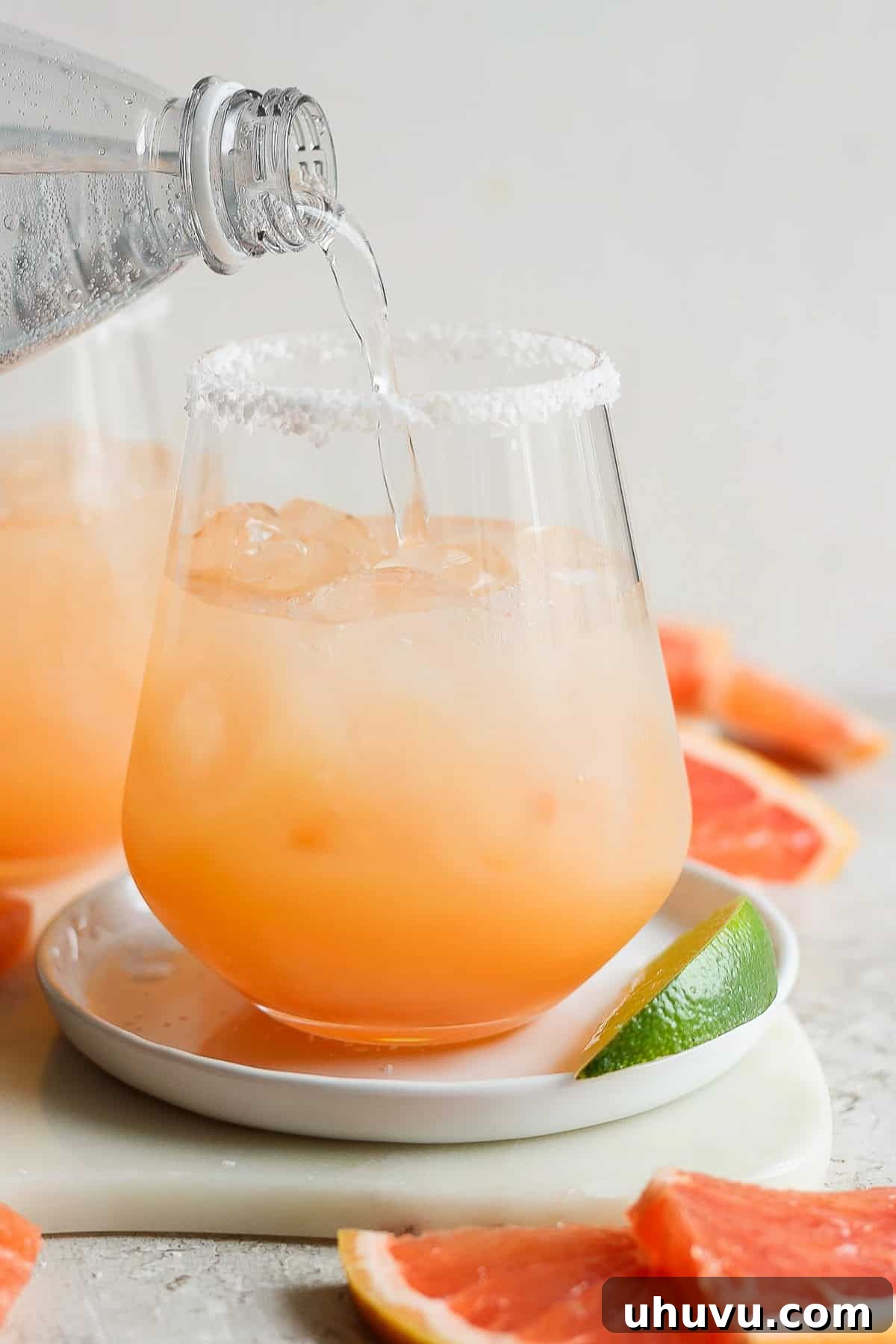 The Perfect Paloma 5 Top off with sparkling water and lime garnish
