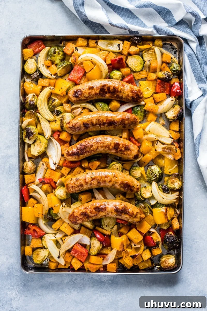One-Pan Wholesome Sausage and Roasted Veggies 6 A plated portion of healthy sheet pan sausage and veggies, perfect for a balanced meal.