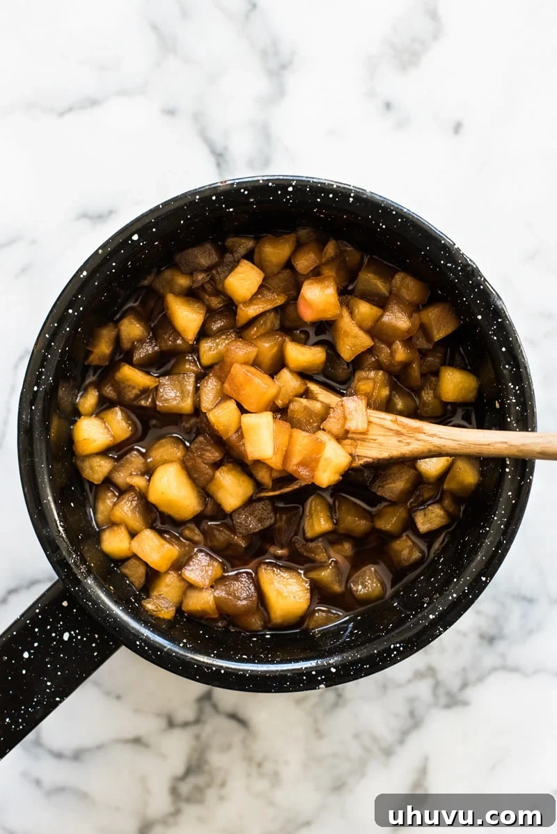 Sweet Apple Hand Pies 3 Baked Apple Empanadas are the perfect dessert for the fall and winter seasons! They're portable, delicious and super addicting.
