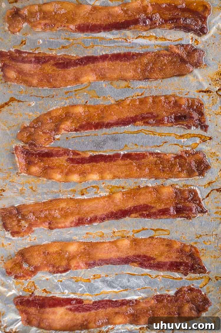Crispy Oven Bacon Every Time 5 cooked bacon in the oven with aluminum foil
