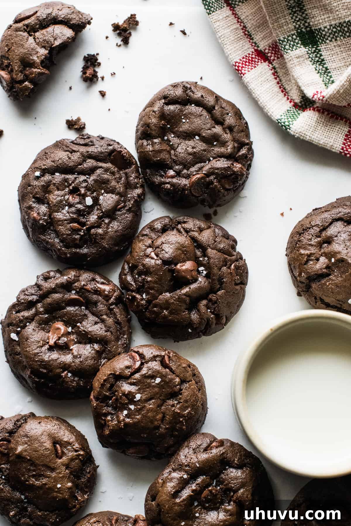 Aztec Chocolate Spice Cookies 6 Mexican Hot Chocolate Cookies on a table with a glass of milk.