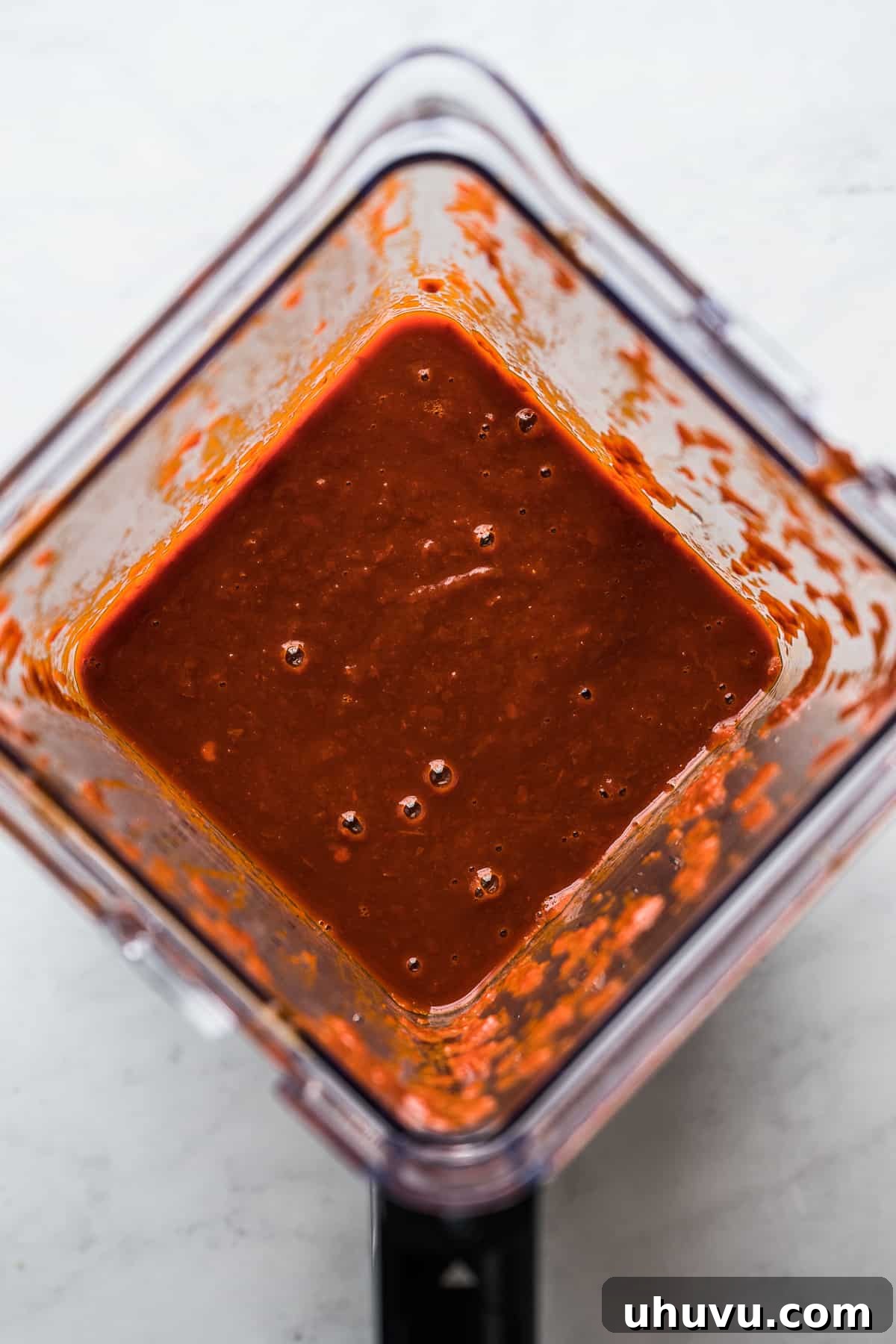 Sunrise Salsa Crunch 6 Smooth red sauce for chilaquiles in a blender, after blending.