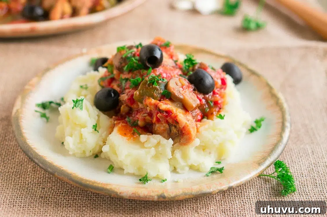 Instant Pot Chicken Cacciatore served with mashed potatoes