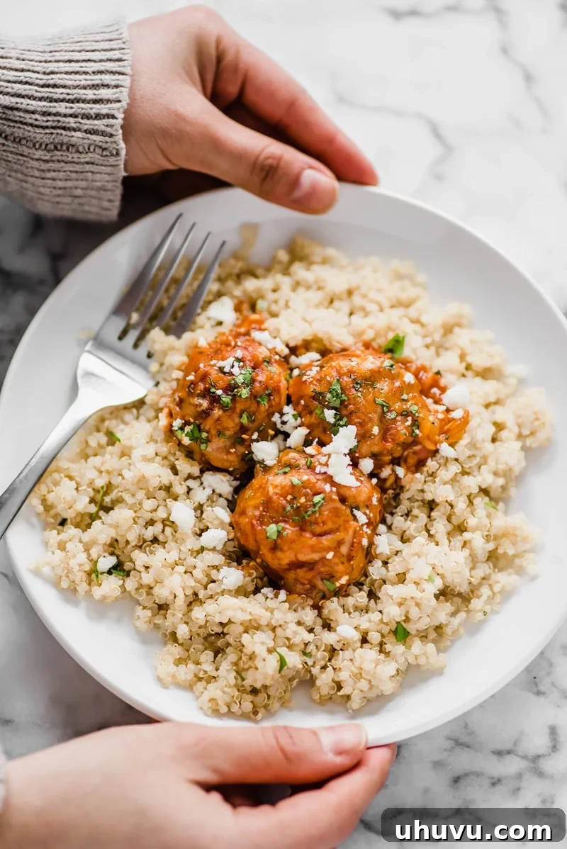 Flavorful Gluten Free Enchilada Chicken Meatballs 4 Gluten-free chicken meatballs ready to be baked, highlighting the mixture's perfect consistency.