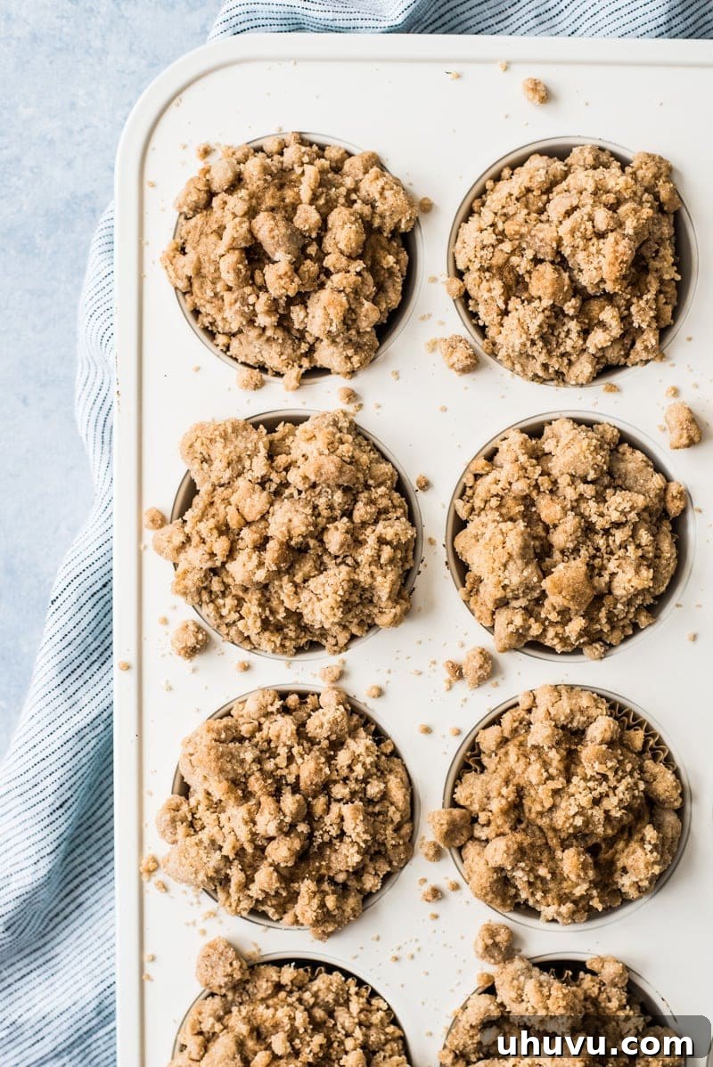 Fluffy cinnamon coffee cake muffins made healthier with Greek yogurt