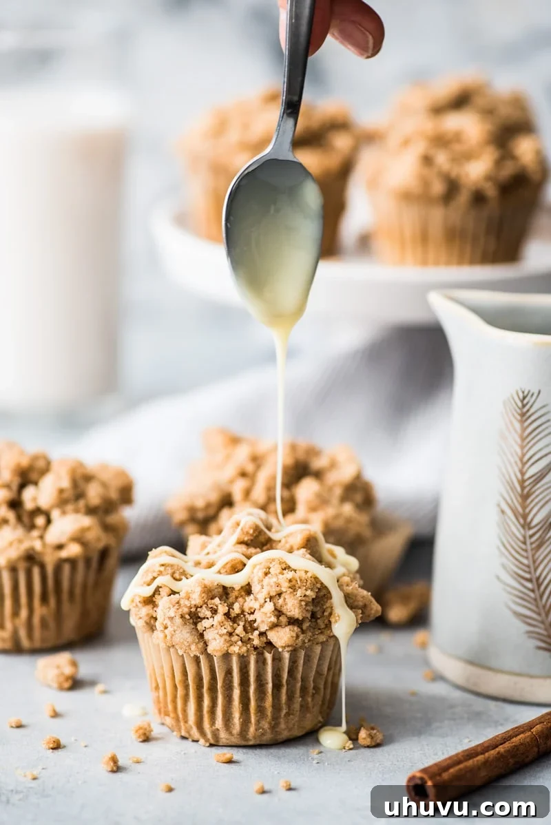 Cinnamon coffee cake muffins drizzled with sweetened condensed milk
