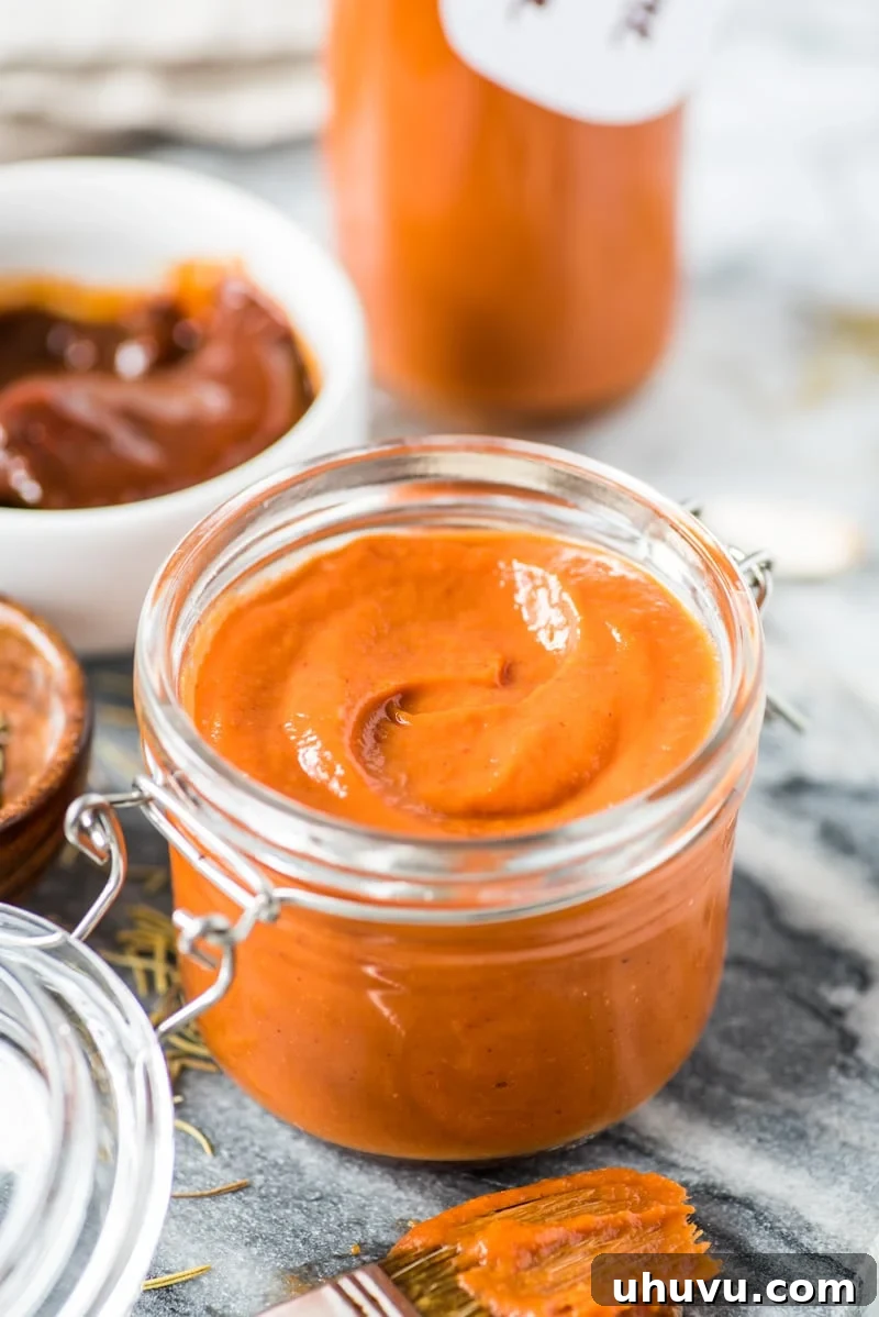 Chipotle Kick Zero Sugar BBQ Sauce 4 Ingredients for sugar-free BBQ sauce blended to perfection, showing its smooth and rich texture.