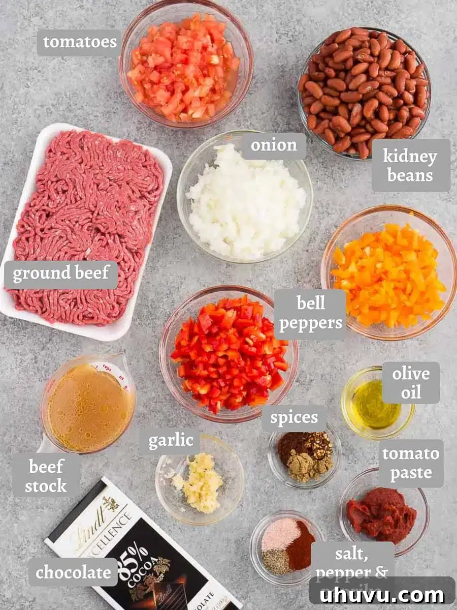 Ultimate Chili Recipe 4 chili ingredients on a board