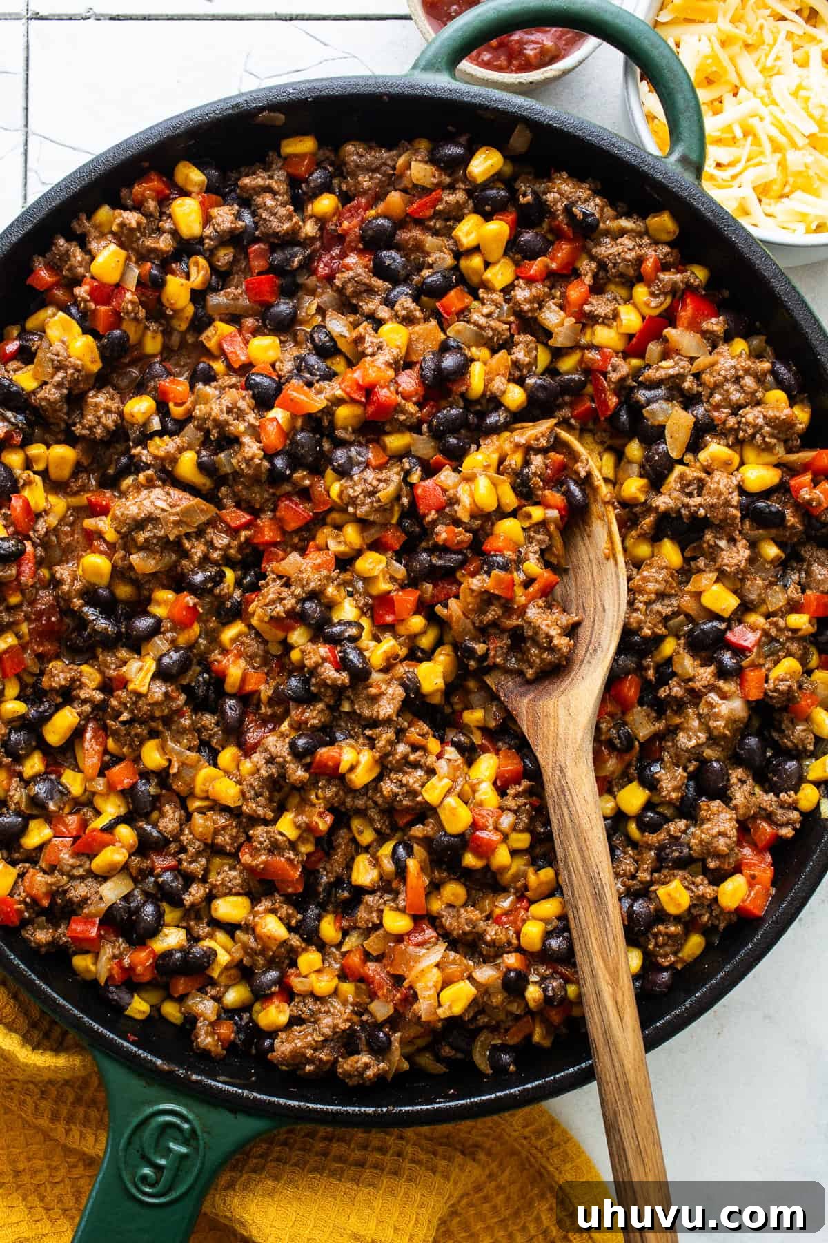 Savory Zucchini Delights 5 Skillet filled with all vegetables and meat to cook together.
