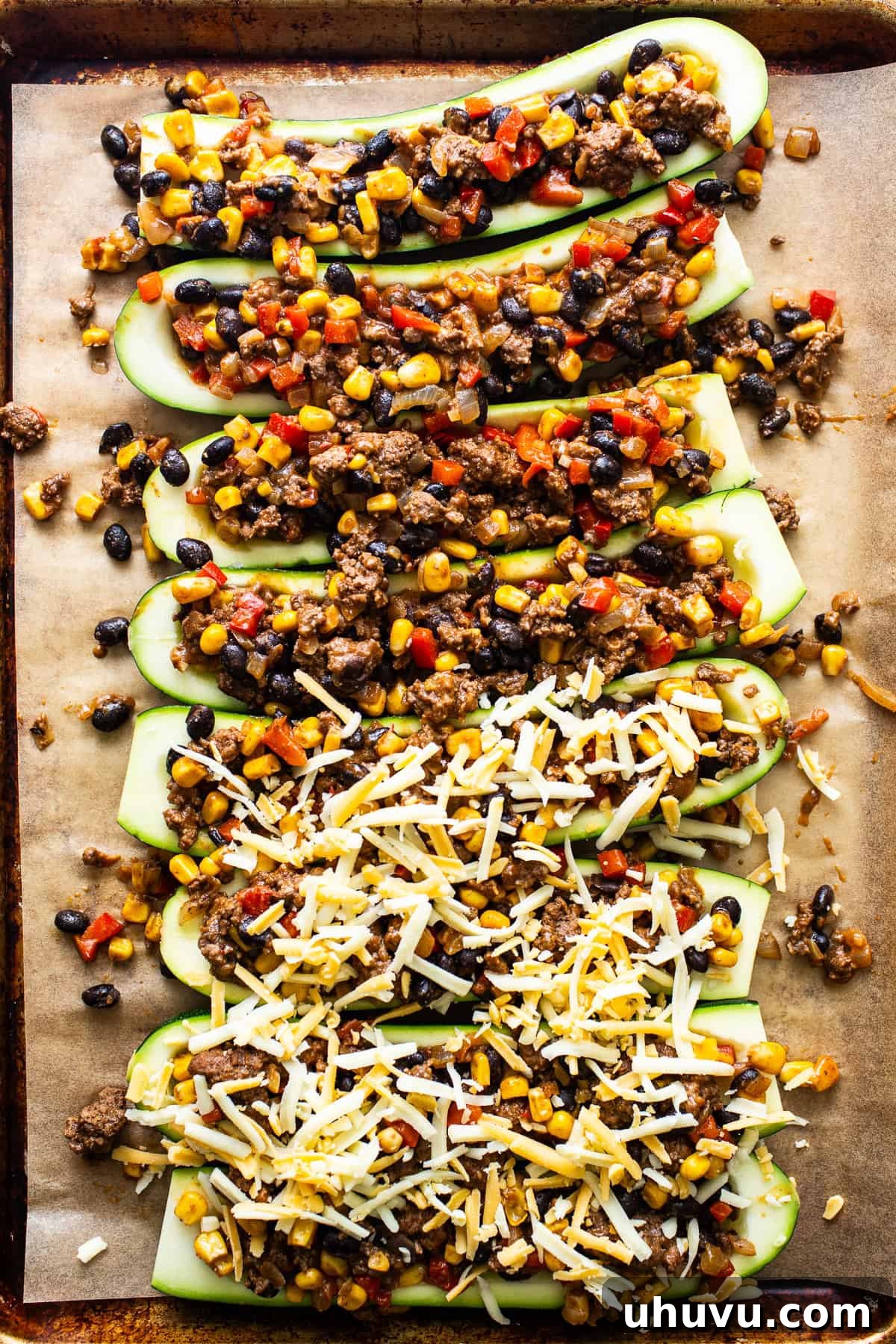 Savory Zucchini Delights 6 Assemble zucchini boats and fill with the meat mixture.