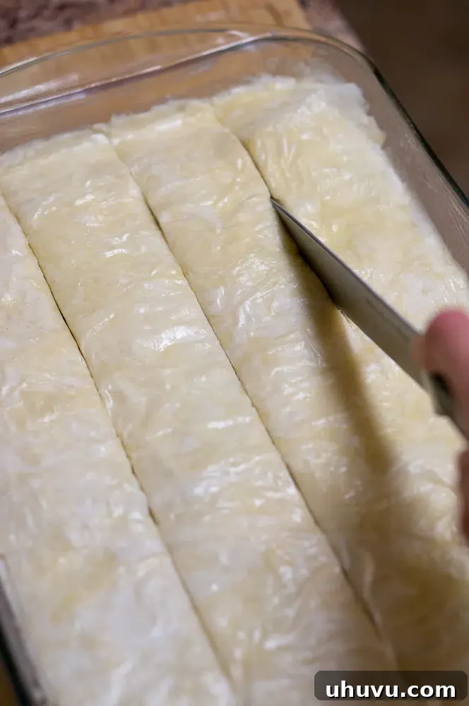 Cutting baklava into strips