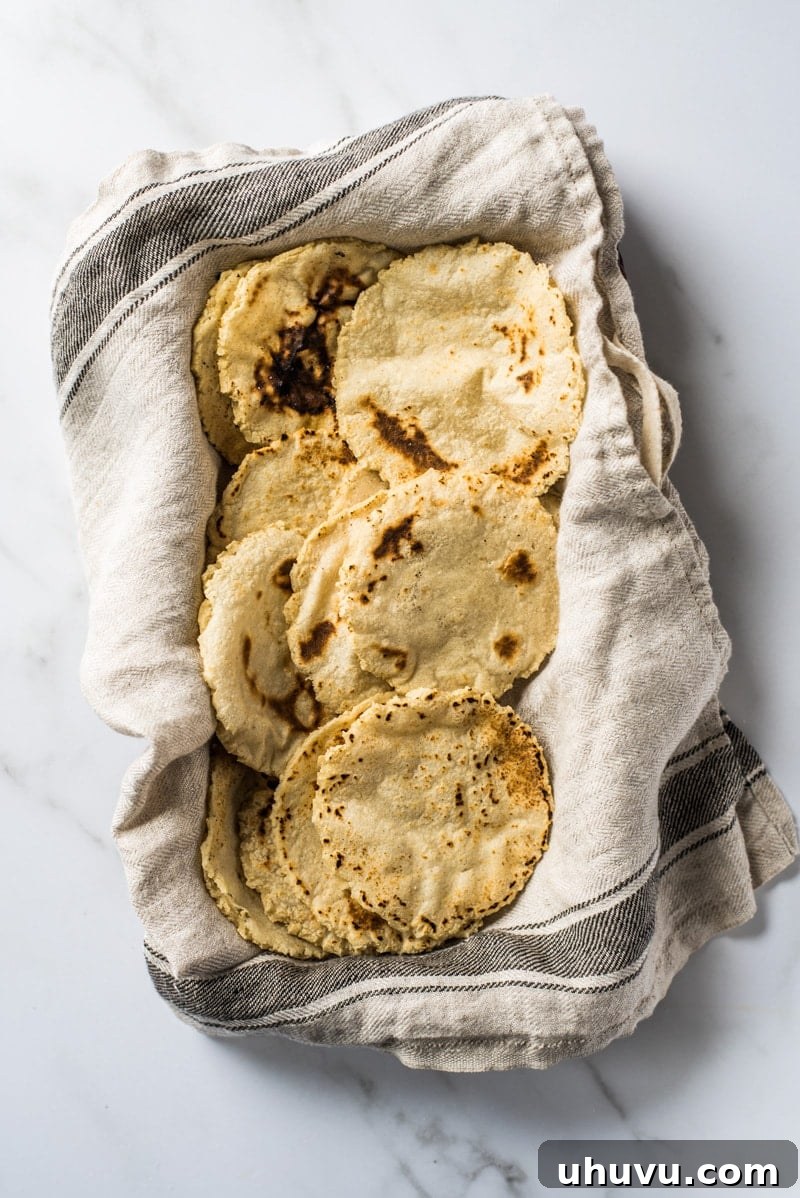 Homemade Gorditas: Authentic Mexican Stuffed Corn Cakes 11 Gorditas on a cotton towel