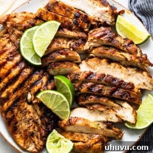 Tequila Lime Chicken, grilled to juicy perfection, garnished with cilantro.