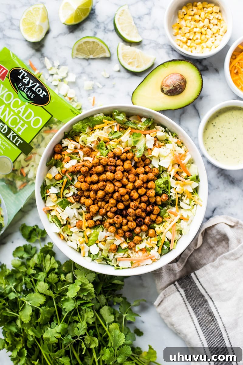 This Avocado Ranch Chopped Salad is loaded with freshly chopped veggies, crispy Mexican roasted chickpeas and creamy avocado ranch dressing! (gluten free, vegetarian)
