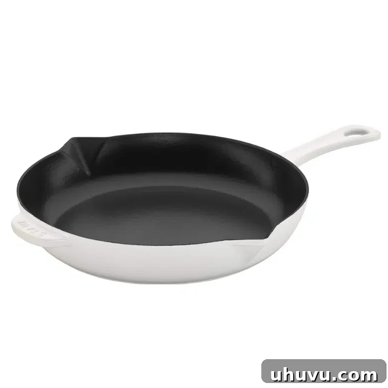 White Staub cast iron skillet, a versatile kitchen essential
