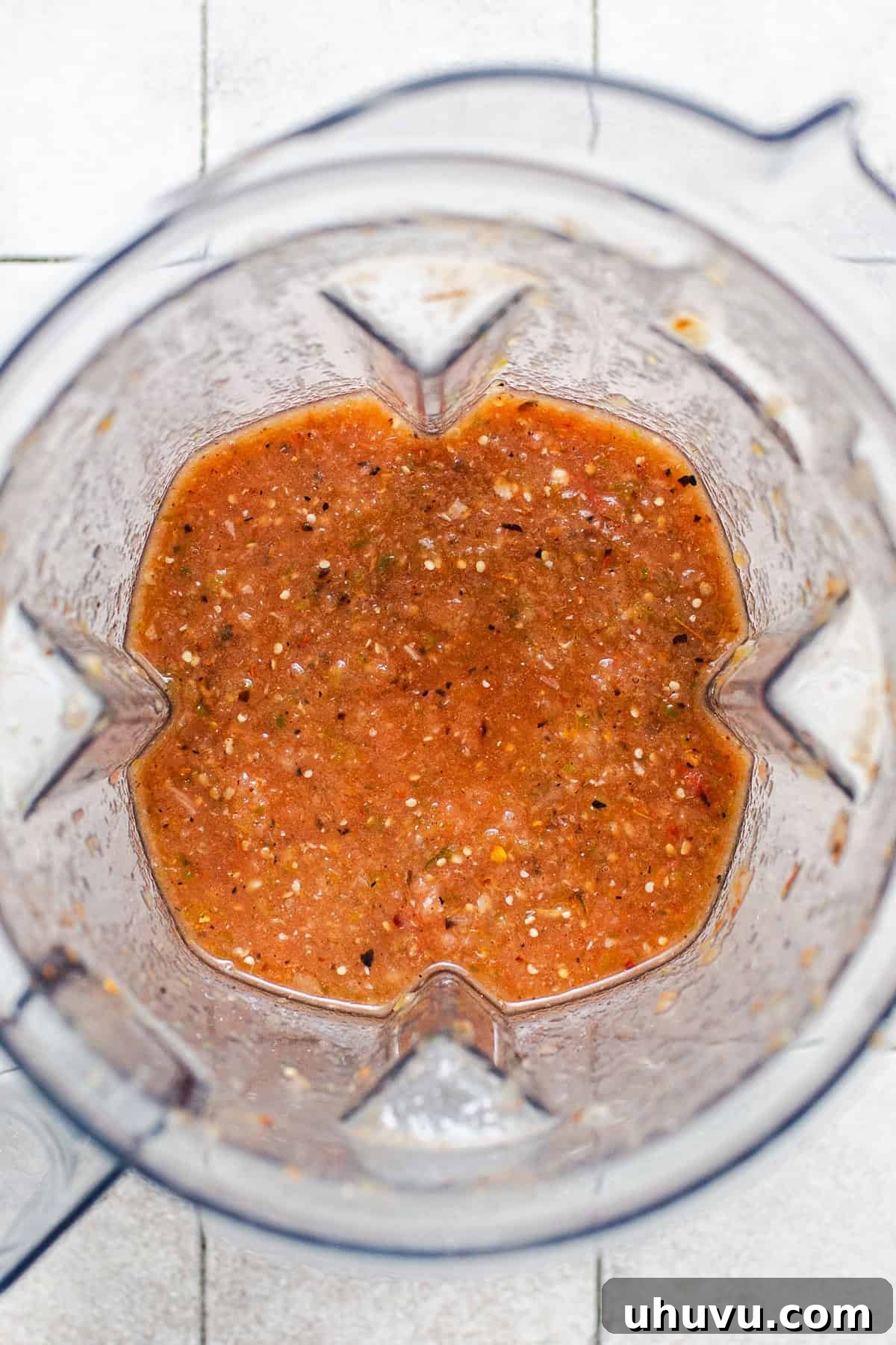 Morisqueta: Authentic Mexican Rice and Bean Dish Recipe 7 The blended roasted salsa in a blender.
