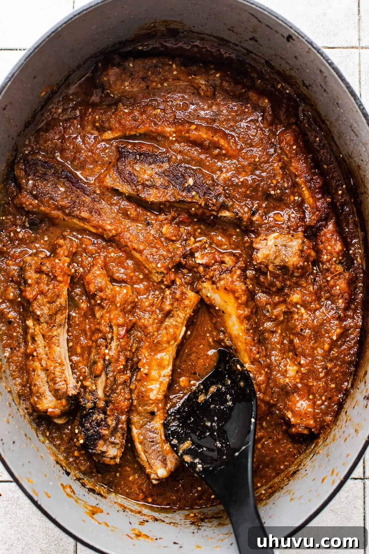 Morisqueta: Authentic Mexican Rice and Bean Dish Recipe 8 The pork ribs cooked in a salsa in a large Dutch oven.