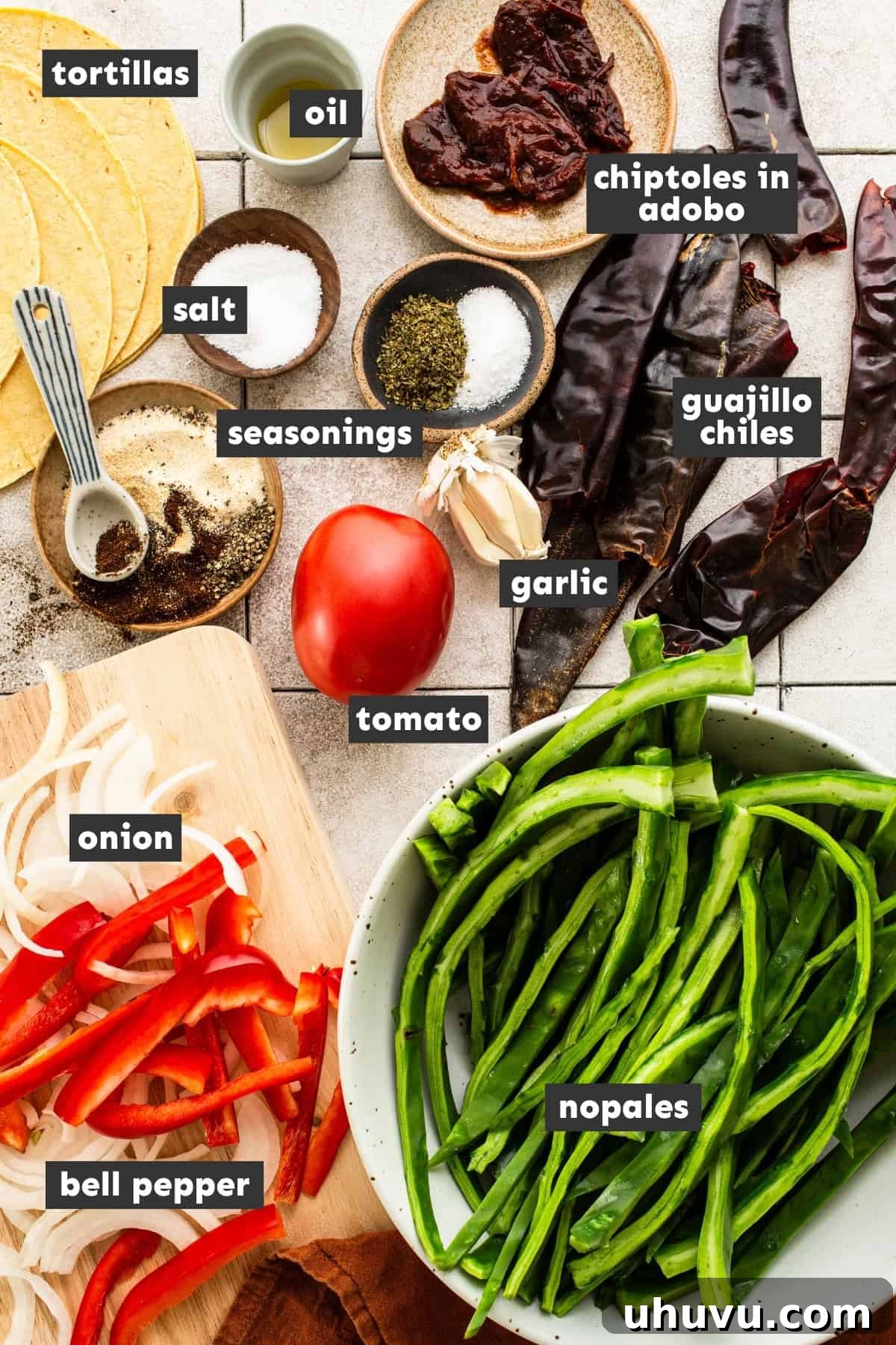 Charred Nopales Tacos with Fresh Salsa and Lime 4 Ingredients in nopales tacos on a table.