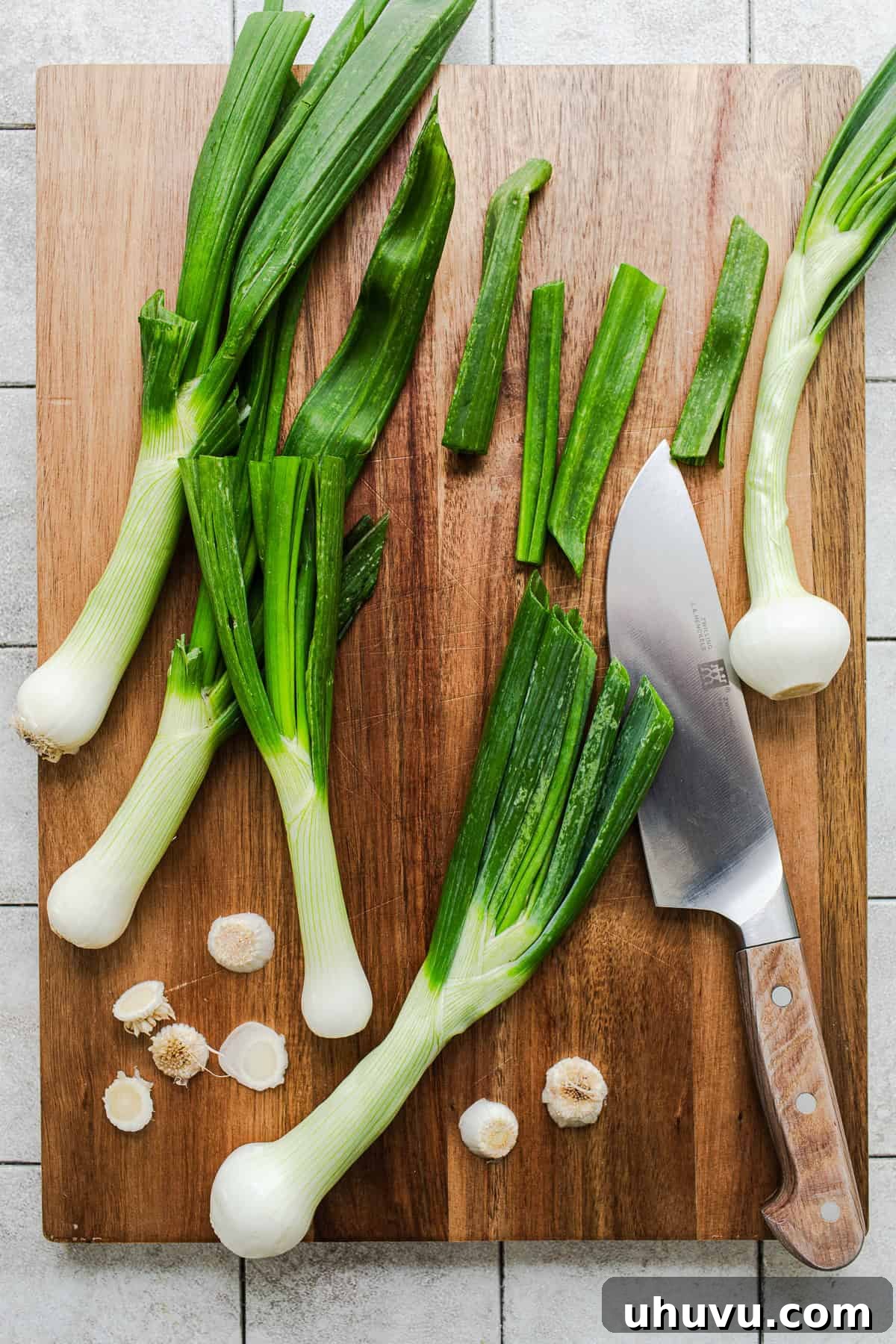 Grilled Cambray Onions Recipe (Cebollitas Asadas) 5 Trimmed cambray onions on a cutting board ready to make cebollitas asadas.