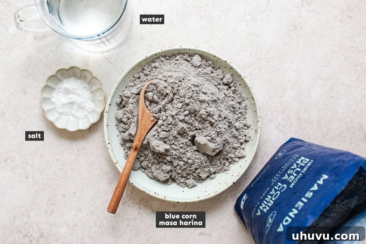 Authentic Blue Corn Tortillas Recipe 4 Ingredients for blue corn tortillas on a table.