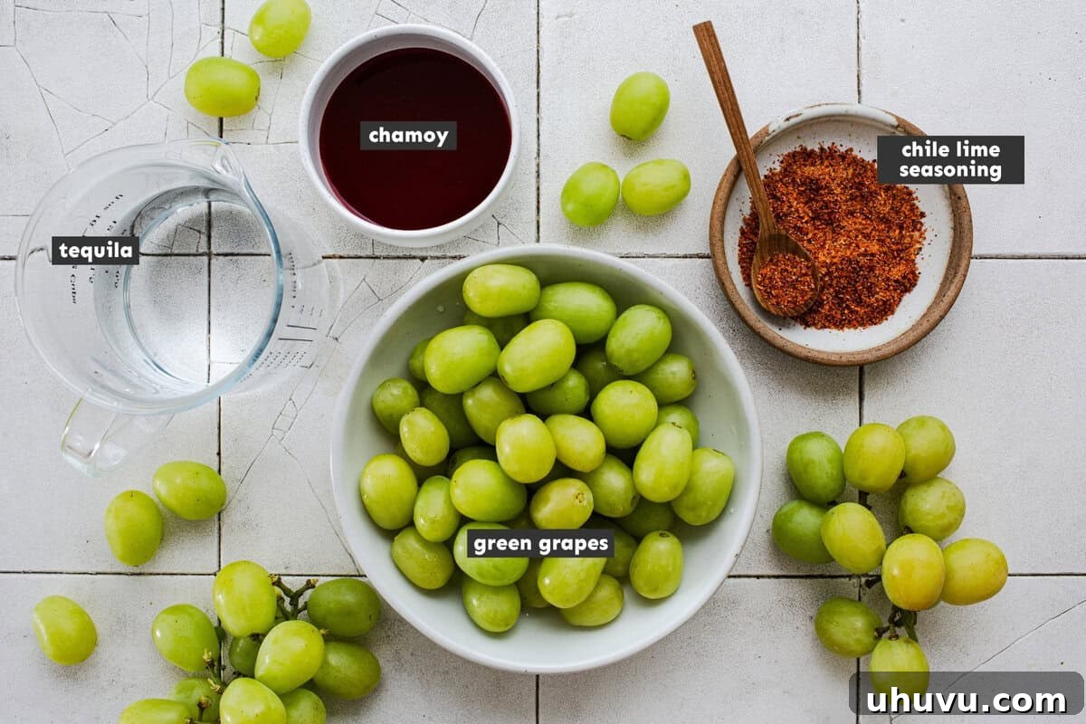 Tequila Chamoy Grapes: Spiked Grapes Recipe 4 Ingredients for boozy grapes including green grapes, silver tequila, chamoy, and Tajín.